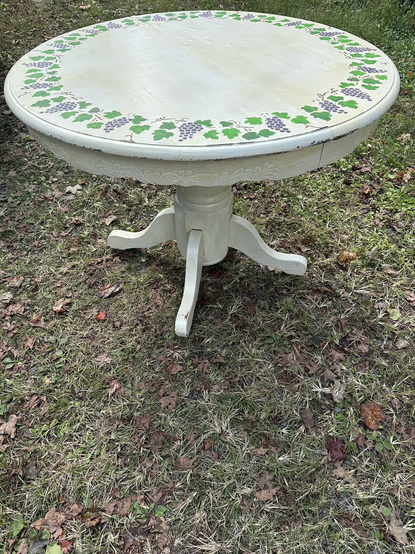 Antique table, vine designs