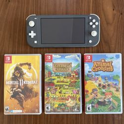 Nintendo Switch Lite with three games