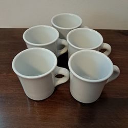 Five coffee mugs