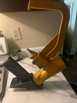 USED This is a Bostitch MIIIFN or MIIIFS pneumatic flooring nailer or stapler, commonly used for installing hardwood floors.