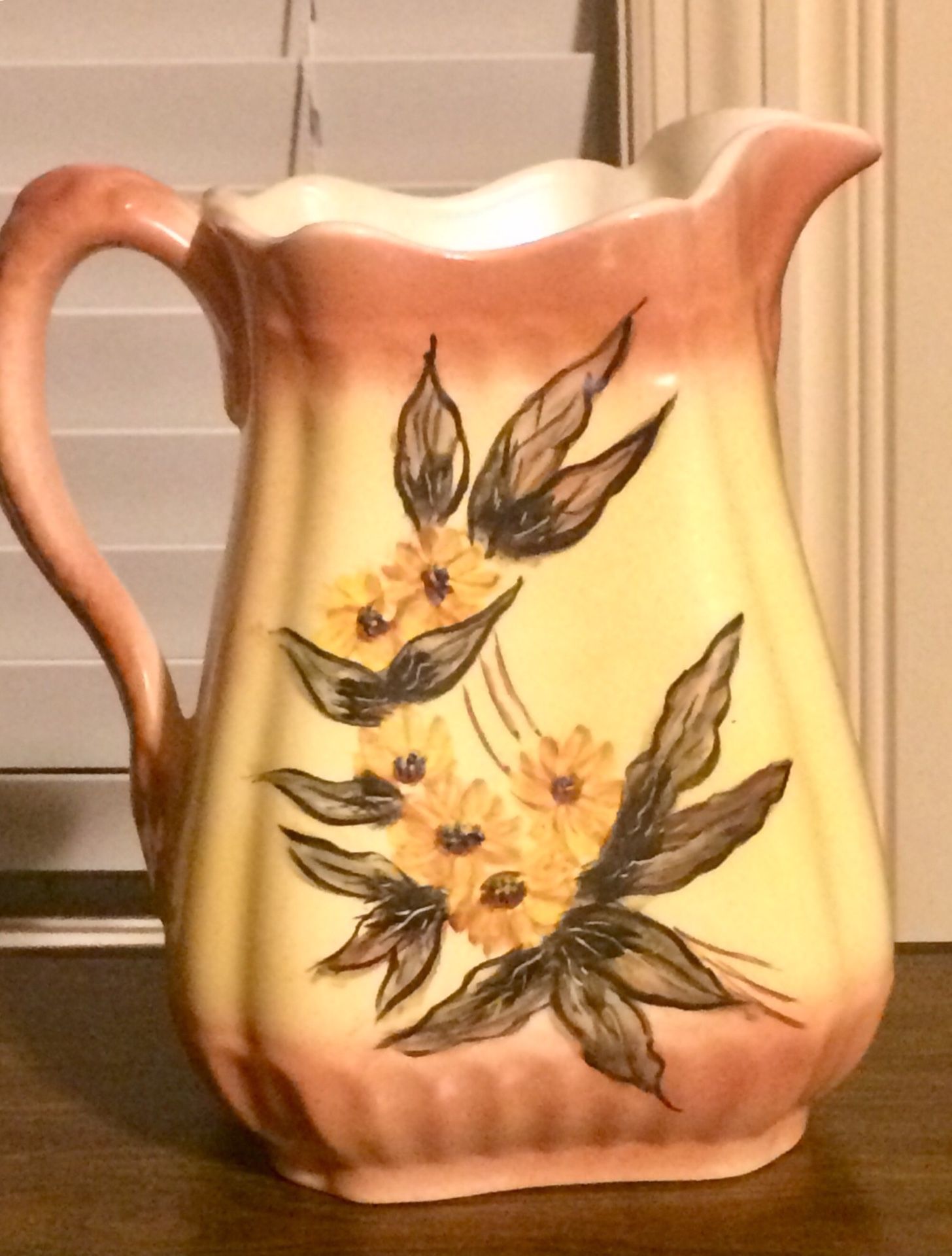 Antique hand painted pitcher