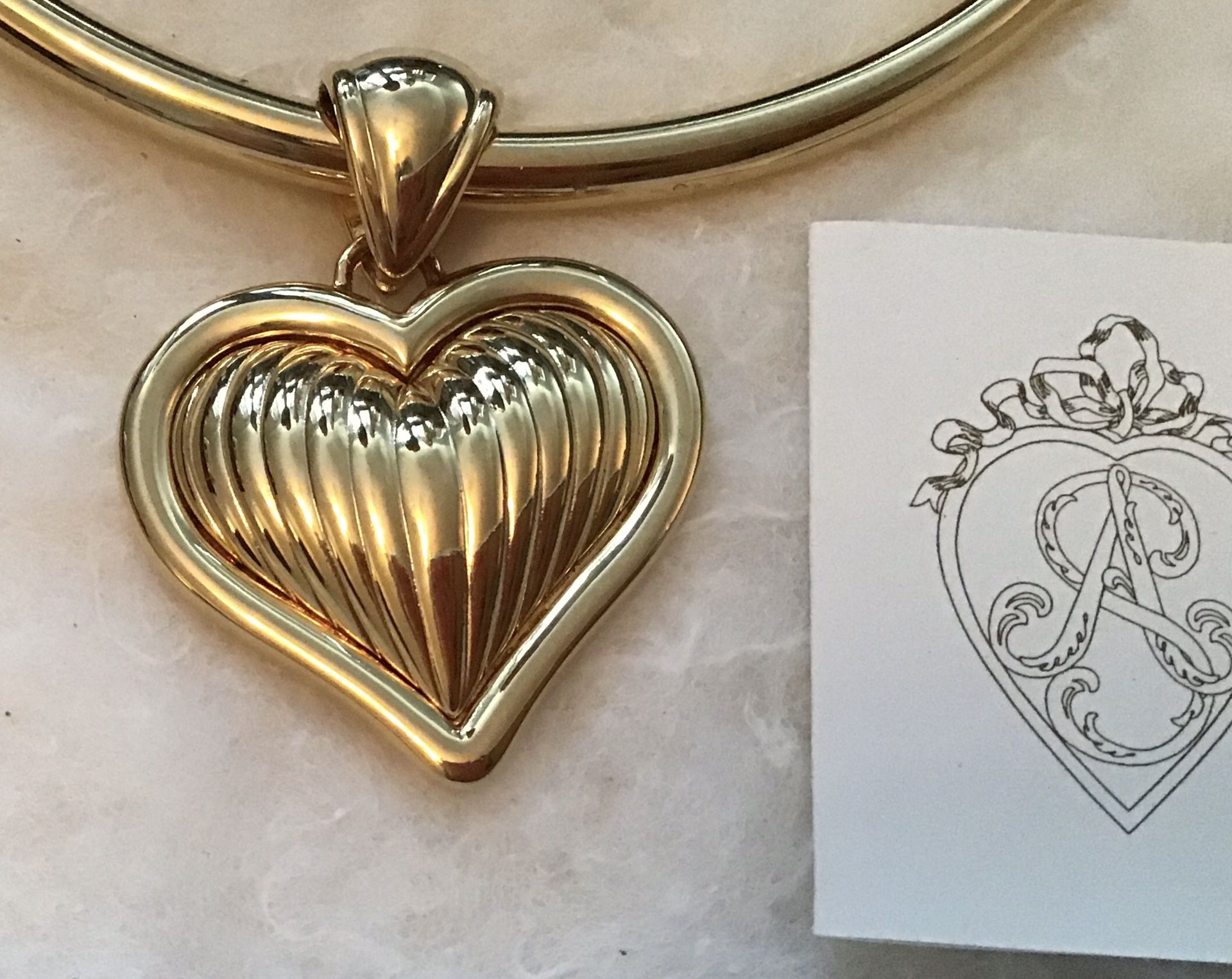Gorgeous necklace. Double sided heart. This would make a lovely gift. Brand new. Never worn