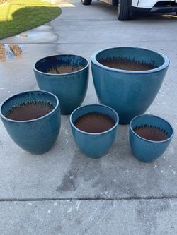 Round Ceramic Pots ($220 set of 5 pieces)