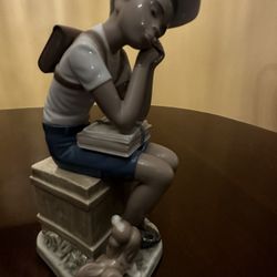 Lladro Figurine - Thinking Boy with a Dog