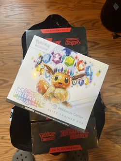 prismatic evolution pokemon center etb