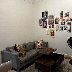 Grey couch and Fold Out Coffee Table