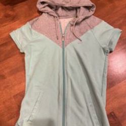 Woman’s Nike short sleeve, zipper jacket size small shipping available