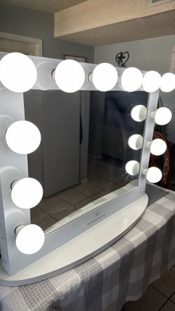 Large vanity mirror.