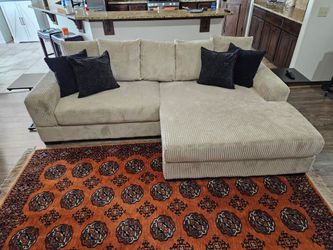 Beige L shaped couch