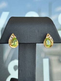 10k yellow Gold Peridot and Diamond Earrings studs