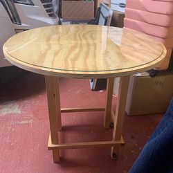 2 round tables with glass top