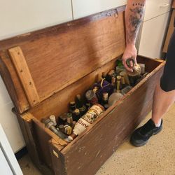 Chest Containing Vintage Unique Glass Bottles