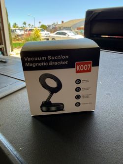 NIB suctioning MagSafe iPhone car mount. 6 available $10 each. Discount for multiple purchases.