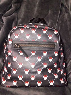 Disney Minnie Mouse All-over Print Mini Backpack Design with A Repeating Mini Mouse Head and Red Bow Pattern