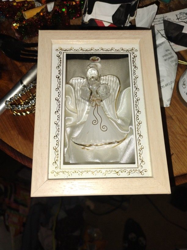 Angel Ornament Enclosed In Glass