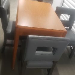 Table And Four Chairs 