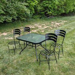 Five Piece Cast Iron Patio Set. Delivery Available