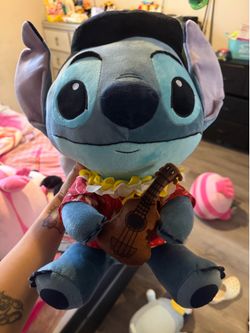 A jumbo stitch Disney Lilo, and stitch plush