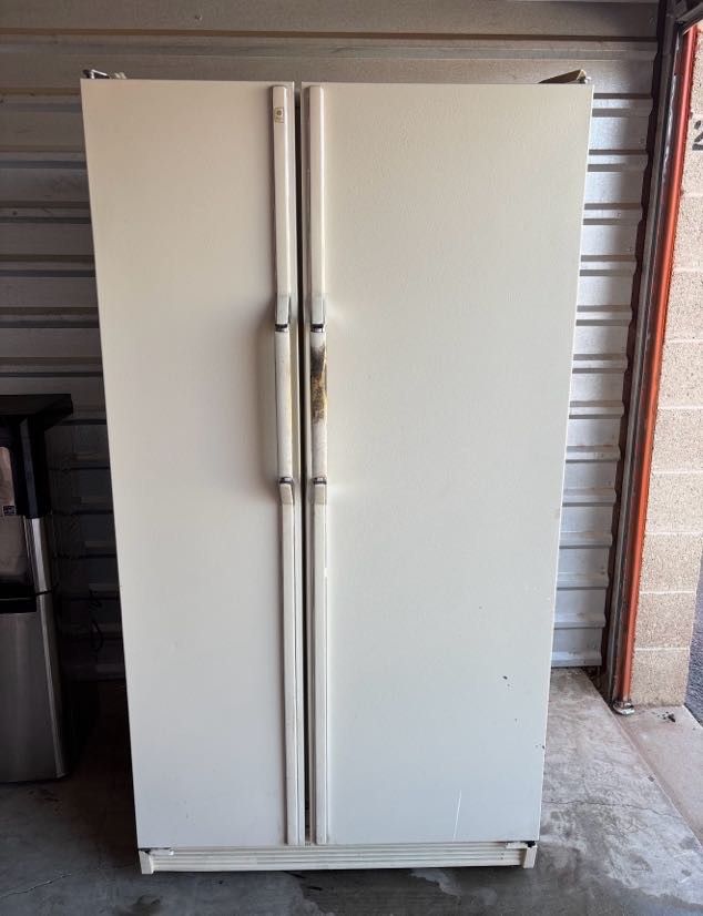 White GE Refrigerator And Freezer
