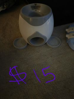 Treat Dispenser And Ball Return