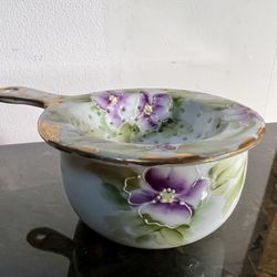 Antique hand painted porcelain tea strainer and bowl