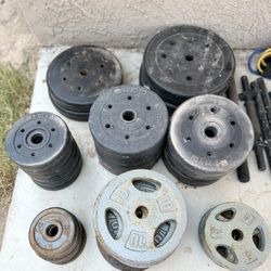 Many weights for Curl Bars & Manual Dumbbells w many other accessories included