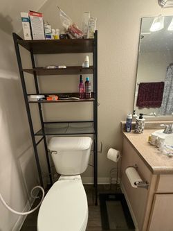 Moving sale Over-the-toilet storage shelf