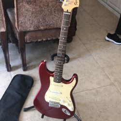 Squier STRAT by Fender Six String Electric Guitar with Case.
