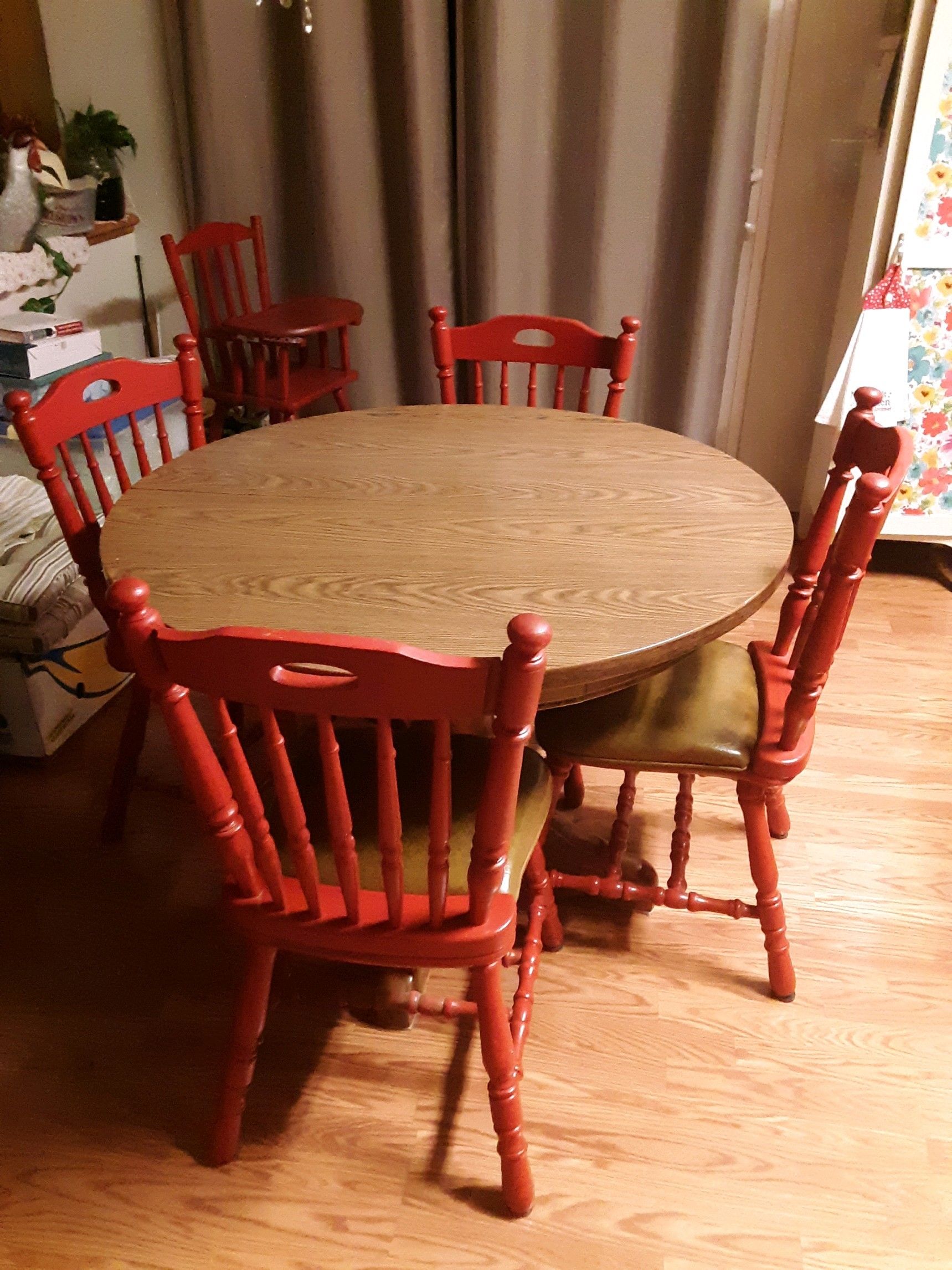 Kitchen table and chairs. Couch. TV armoire