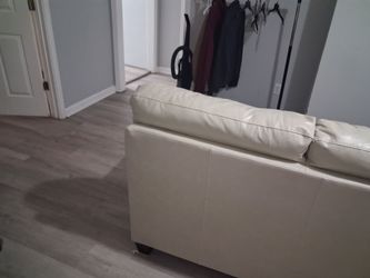 Barely use beige leather sofa for sale