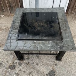 32” Outdoor Fire Pit Table – Wood Burning Bonfire Patio BBQ, Bronze Metal Fire Bowl with Lid, Grill, Spark Screen & Waterproof Cover  Description: Enj