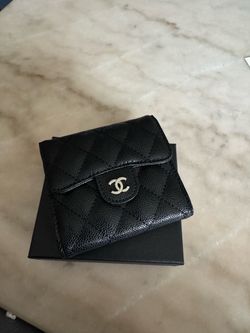 Black card, woman holder