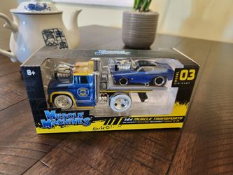 10$ Muscle Machines 1:64 Transports