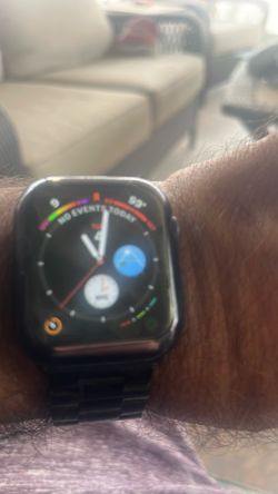 Apple Watch Series 4 (GPS), featuring a 44mm Space Gray Aluminum Case and a Black Sport Band.