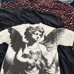 that’s a hole lot of Cough Syrup shirt