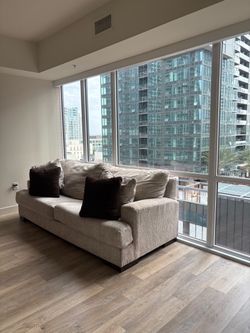 Light beige Fabric Sofa with Throw Pillows
