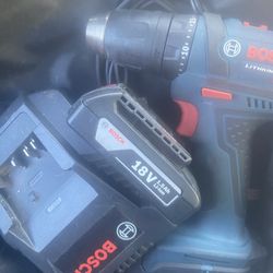 Bosch Cordless Lithium drill was charger two batteries in the case used it a couple times like new