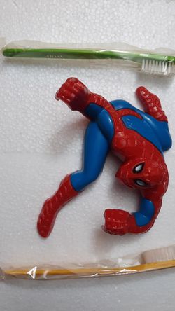 Avon the amazing spider man toothbrush holder and 2 toothbrushes