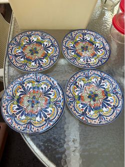 Set of four melamine dishes in great condition