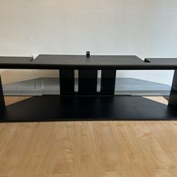 Television stand with glass shelve