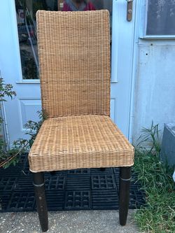 Pier One Wicker High-Back Dining Chair Dark Wood Legs