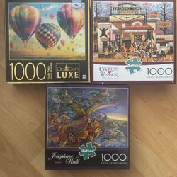 Assorted 1000 Piece Puzzles - $5 Each