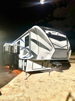 2016 keystone fuzion toy hauler/ rv/ travel trailer/ fifth wheel