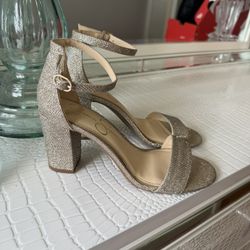 Jessica Simpson pumps, champagne color, size 7, 3-inch heel. In very good condition—worn only once.
