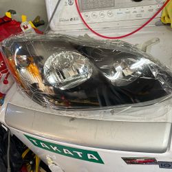 2007 Toyota Corolla Headlight Housings Pair