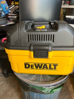 Dewalt, vacuum cleaner, wet, and right usually twice with attachment like new condition
