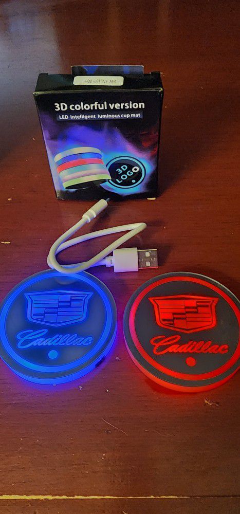 2 Cadillac Led Color Changing USB Car Cupholder Coasters.  Other Cars Available.  SHIPPING AVAILABLE 