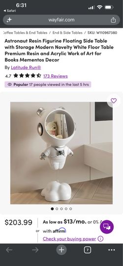 Floating astronaut end table