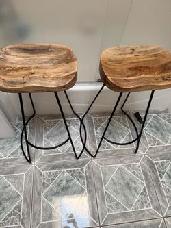 wood seat and black steel legs