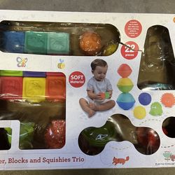 PlayGo Stacker, Block and Squishy Trio, a 22-piece sensory toy set designed for toddlers. 